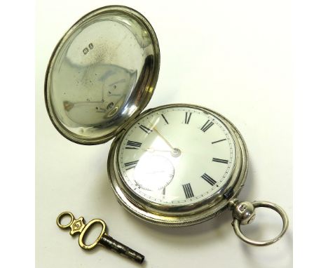 Full hunter silver pocket watch by John Mansfield, hallmarked London 1871. The white enamel dial applied with black roman num