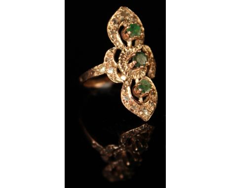 Yellow metal ring vertically set with 3 emeralds size N weight 3.7 grams