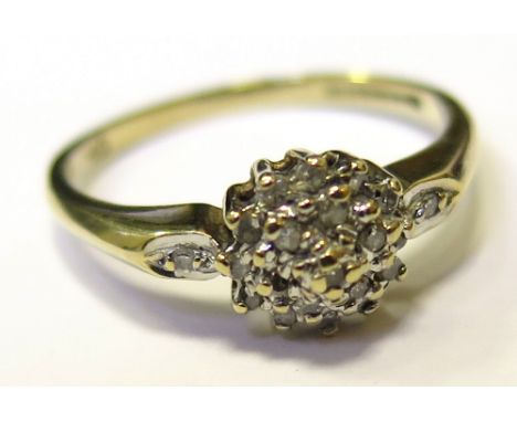 9ct gold Floral set Diamond ring 0.10ct size M weight1.9 grams