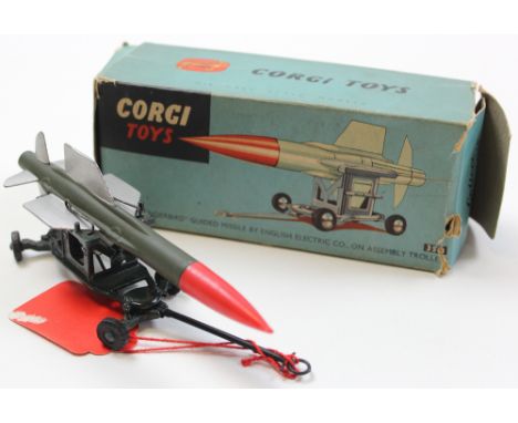 Boxed Corgi toy 350 "Thunderbird" Guided Missile with the navy blue assembly trolley, the pale green rocket with red plastic 