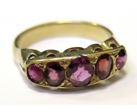 Yellow metal ring set with 5 Rubies size K weight 2.9 grams