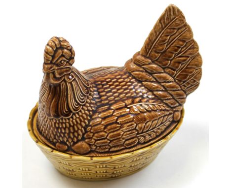 A vintage beswick egg container shaped as a hen on a basket 19 cm across