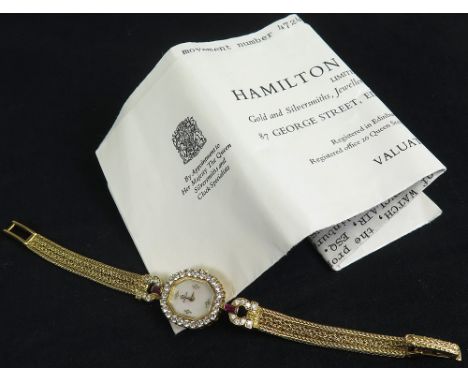Ladies 18ct gold Omega quartz wristwatch. Mother of pearl dial with four diamonds set at 12, 3, 6 & 9 o'clock. The octagonal 
