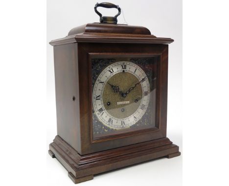 Tiffany Bracket clock with a westminster chime, movement by seth Thomas and in an oustanding polished burr wood case.
