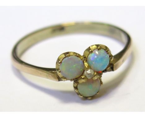 9ct ring set with a trefoil of Opals with a small Diamond centre size O weight 2.0 grams