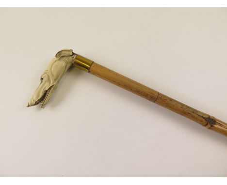 Greyhound Head gents walking stick, well detailed design, an early piece attached to a more modern cane. (AF)