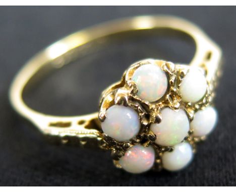 9ct Opal Ring set in Floral pattern size O weight 2.1 grams