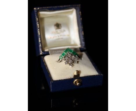 18ct White Gold ring set with a wishbone of Emeralds and a Starburst of Diamonds size Q weight 4.8 grams