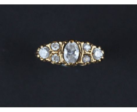 9ct Gold ring set with central marquise CZ surrounded by round CZ, size J weight 3.5 grams