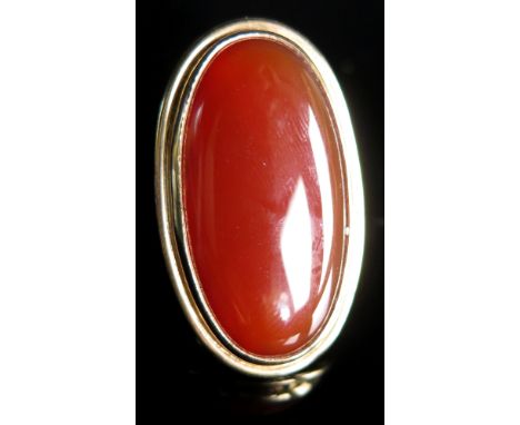 Yellow metal Ring with large oval Carnelian size I weight 12.2 grams