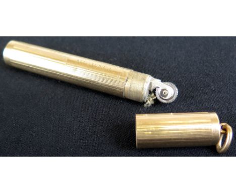 Cylindrical Lighter and hanging ring by Cartier London