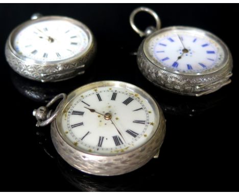 Three ladies Silver Fob watches all with white/coloured enamel dials 