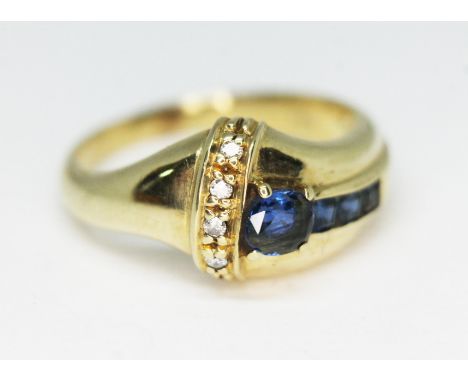 A diamond and sapphire cluster ring, marked '585', gross wt. 6.2g, size R/S.  