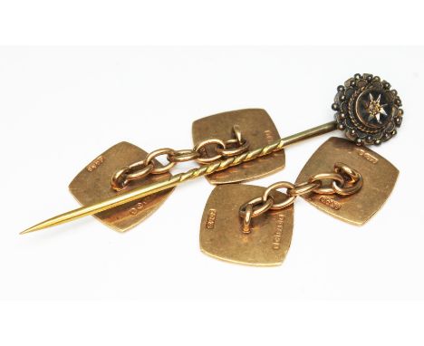 A pair of hallmarked 9ct gold cufflinks and a stick pin marked '9ct', gross wt. 6.9g.  