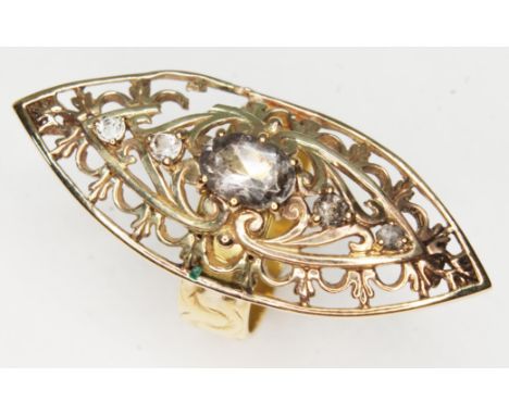 An aquamarine ring, the hallmarked 9ct gold marquis shaped cluster set with five stones mounted on a hallmarked 18ct gold wed