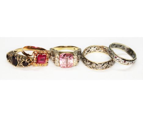Five assorted rings comprising a synthetic ruby and diamond ring unmarked, a hallmarked 9ct gold pink and colourless CZ ring,