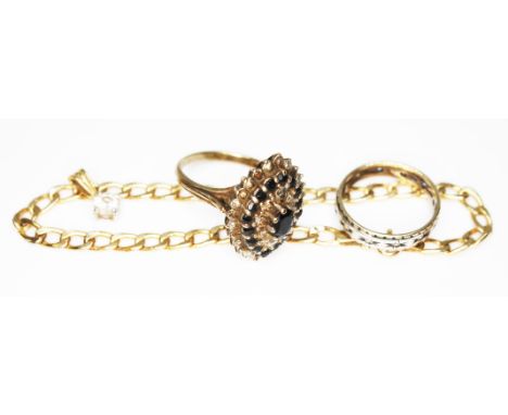 A mixed lot comprising a chain marked '375' wt. 1.8g,  a hallmarked 9ct gold ring cluster ring wt. 6g, a hallmarked 18ct gold