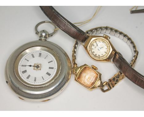 Three watches comprising a ladies watch marked '14K', a hallmarked 9ct gold wristwatch and a pocket watch marked 'Fine Silver