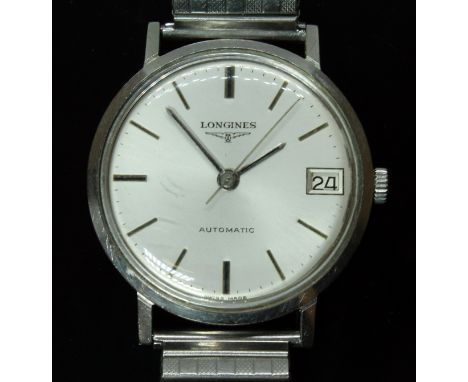 A Longines stainless steel automatic watch, circa 1967, ref. 7844-1, cal. 345, diam. 35mm, signed silvered dial, baton hour m