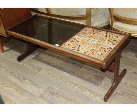 A mid 20th century G Plan teak tile and smoked glass top coffee table, length 121cm.  