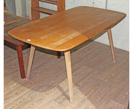 An Ercol light elm 'Plank' table, height 71cm, length 153 and width 83cm.Condition:- General wear through age and use, crack 