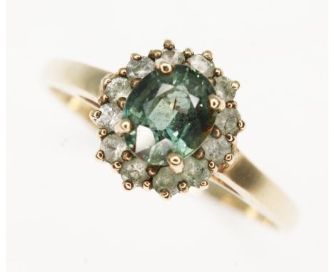 A hallmarked 9ct gold alexandrite cluster ring, gross wt. 2g, size R.  