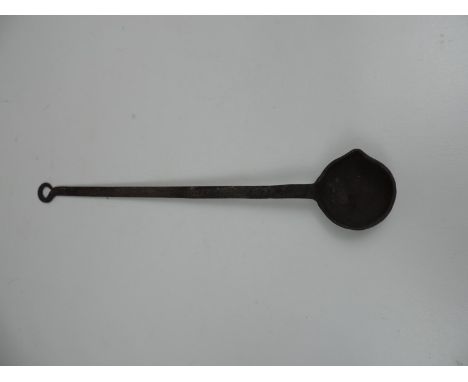 An Antique Cast Iron Blacksmith's Ladle