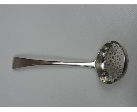 A George III Silver Sugar Sifter Ladle, a pierced bowl, initialled terminal and inscribed date '1815' by the hallmarks. It is