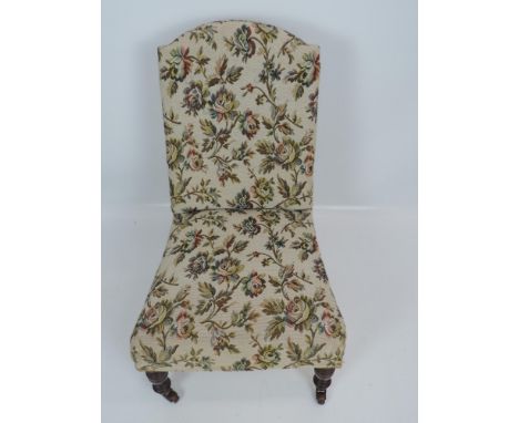 Button Backed Nursing Chair on Caster Feet 