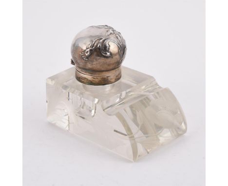 
	
		A FRENCH SILVER COLOURED MOUNTED AND ETCHED GLASS INKWELL
		MINERVA MARK
		The domed cover embossed with a flower and th