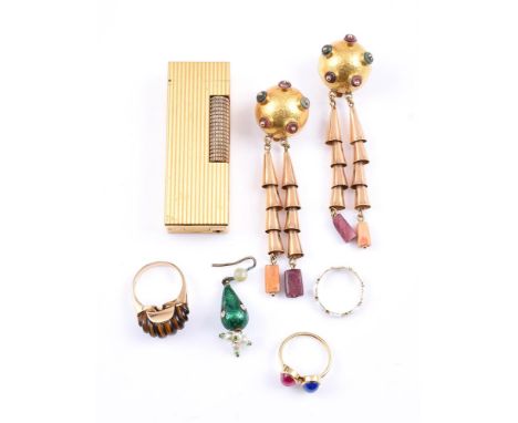 
	
		A COLLECTION OF GOLD COLOURED JEWELLERY AND OTHER ITEMS
		Comprising a pair of 1970s hammered gold coloured bomb&#233; p