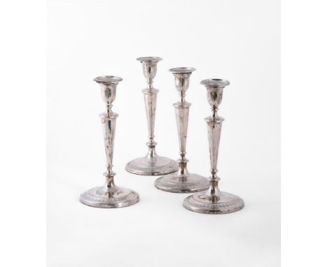 
	
		A MATCHED SET OF FOUR GEORGE III SILVER CANDLESTICKS
		TWO BY JOHN PARSONS &amp; CO., SHEFFIELD 1792, THE OTHER TWO MAKE