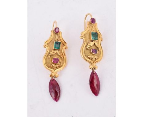 
	
		A PAIR OF GOLD COLOURED PANEL EARRINGS
		The tapering shaped panels set with a trio of emeralds and rubies with foliate 