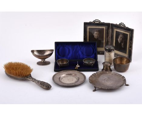 
	
		A COLLECTION OF SILVER ITEMS
		To include: a silver shaped circular waiter by Edward Barnard &amp; Sons Ltd., London 193