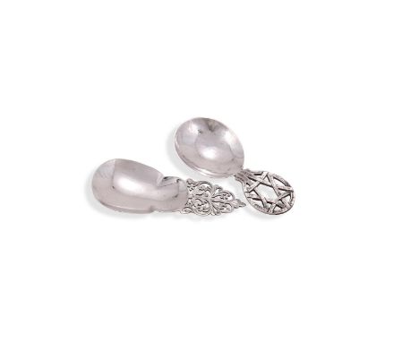
	
		A SILVER CADDY SPOON
		ALBERT EDWARD JONES, BIRMINGHAM 1918
		With an oval handle pierced with strapwork and a hammered 