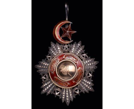 *Turkey, Order of the Medjidjie, Third Class, Commander’s neck badge in silver with gold and red enamel centre, width 58.5mm,