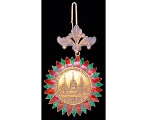 *Thailand, Order of the Crown, Third Class, Commander’s neck badge, in silver-gilt and enamels, circa 1910, width 49.5mm, tar