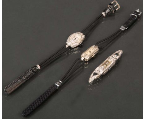   Zwei Damenarmbanduhren, u.a. Marke Marvin und ein -gehäuse, Marke Technos Ancre. 14 ct. Weißgold, ca. 9 g, bzw. 18 ct Weißg
