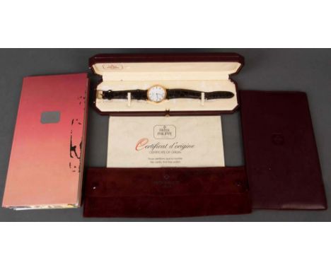   Patek Philippe-Armbanduhr. 18 ct Gelbgoldgehäuse, mit Zertifikat, Referenz Calatrava 3520/D vom 16.5.1992, im Etui. (Funkti
