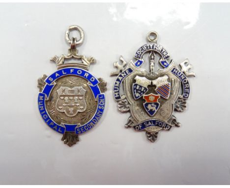 'HUMANE SOCIETY FOR THE HUNDRED OF SALFORD' SILVER SHELD SHAPED MEDAL FOB
the obverse with enamel decoration, the reverse dat