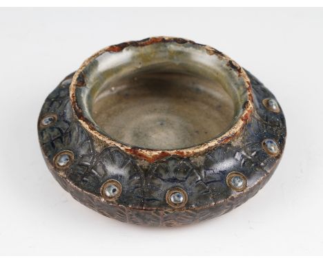 A 19th Century Martin Brothers Martinware art pottery open salt, having petal and leaf design of low squat form with blue and
