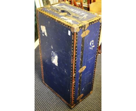 A vintage steamer trunk with blue body and metal fittings belonging to R. A. Clemetson together with Changi Industries Incorp