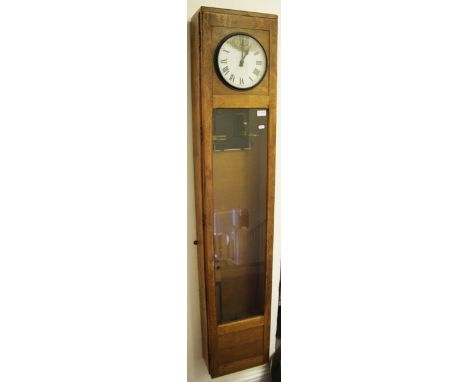 A light oak cased Magneta master clock, having white face with black Roman numeral markers with minute track border, face A/F