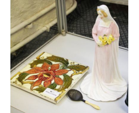 An early 20th Century Minton floral tile, Royal Doulton figure The Bride HN1600 and small silver bowled spoon with ivory hand