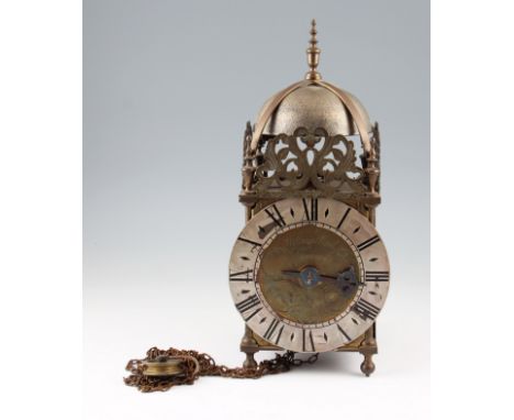 An 18th Century William Flint, Charing brass lantern clock, with silvered chapter ring with black Roman numeral hourly marker