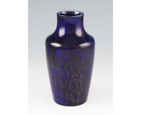 An early 20th Century Ruskin pottery vase of shouldered form with deep blue flambé glaze with tonal lighter blue areas, stamp