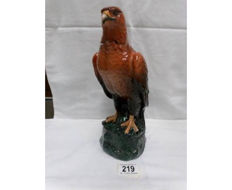 A Royal Doulton Whyte and Mackay golden eagle whisky decanter