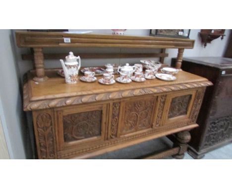 A light oak court cupboard