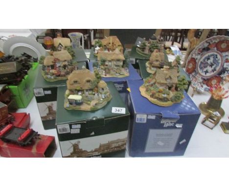 8 boxed Lilliput Lane house/cottages including 'Roll Out The Barrel', 'Gossip Gate', 'Cruck End', 'The Planetarium' etc