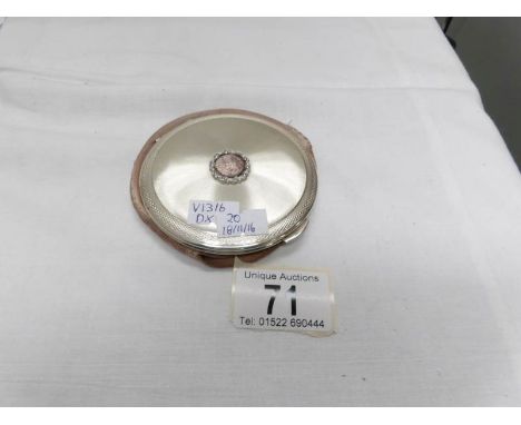 A quality heavy engine turned silver ladies compact dated London 1963 and inscribed on rim